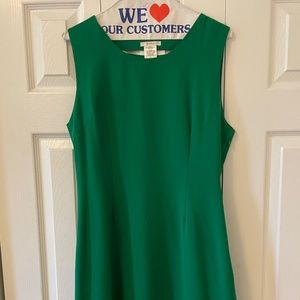 Short green dress with slit back detail